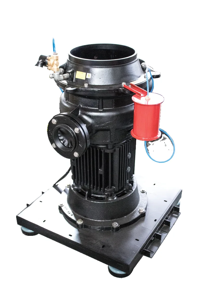 Larger Tabletop crusher: black cast grinding chamber and motor on a steel base plate, with flushing valve and red limit switch