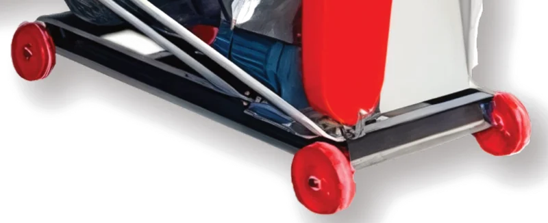 Steel frame on red wheels carrying the motor