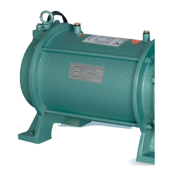The open well pump’s green cast-iron motor body with its lifting eye, cable and rating plate