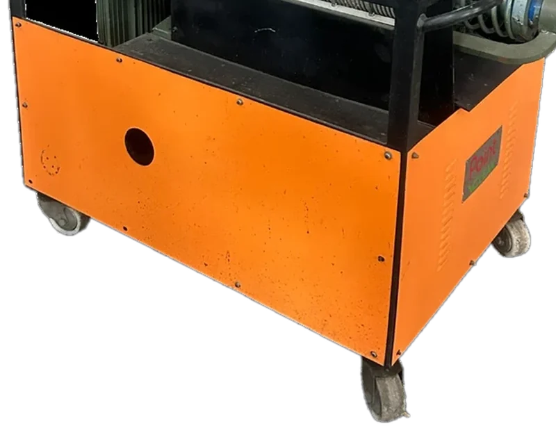 Orange steel cabinet frame on rubber-tyred castor wheels
